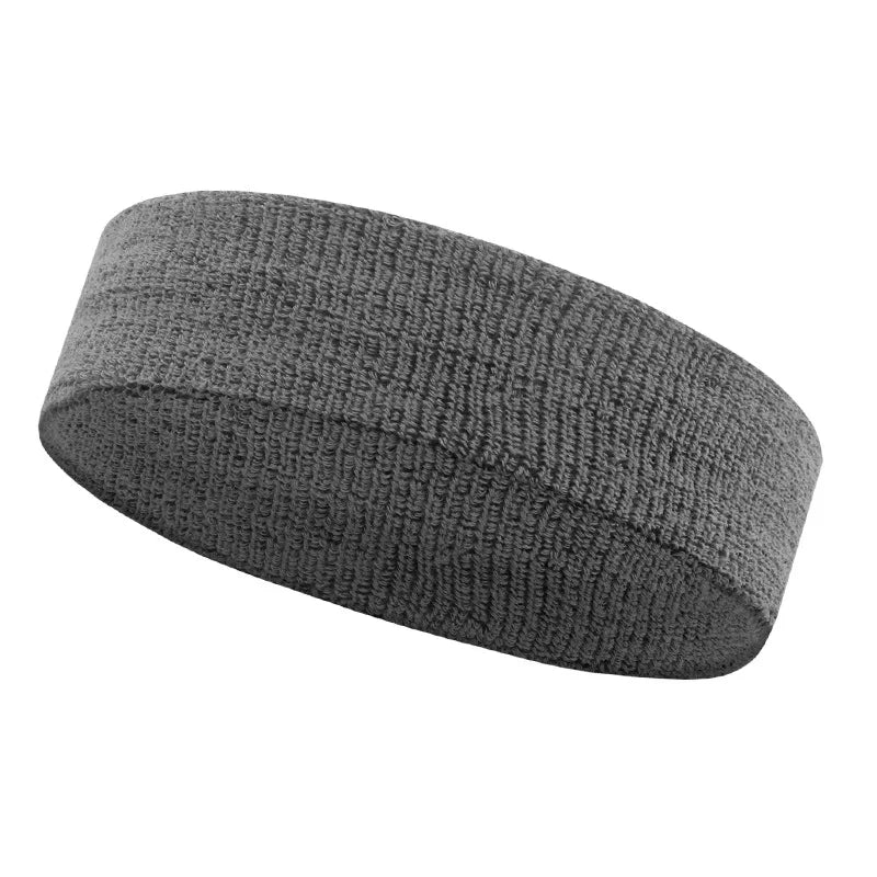 A dark gray, textured athletic headband is shown from the side.