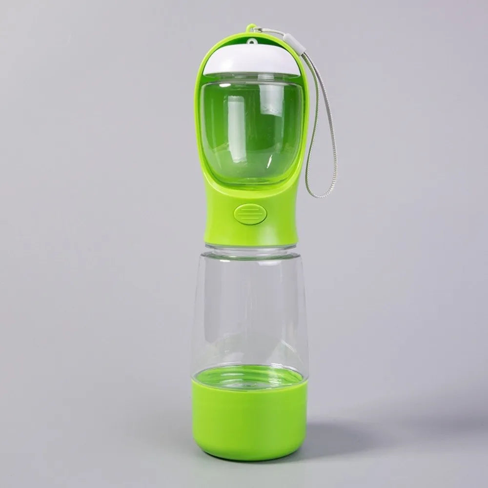 A bright lime green 3-in-1 portable pet water and food dispenser with a clear top and bottom chamber.