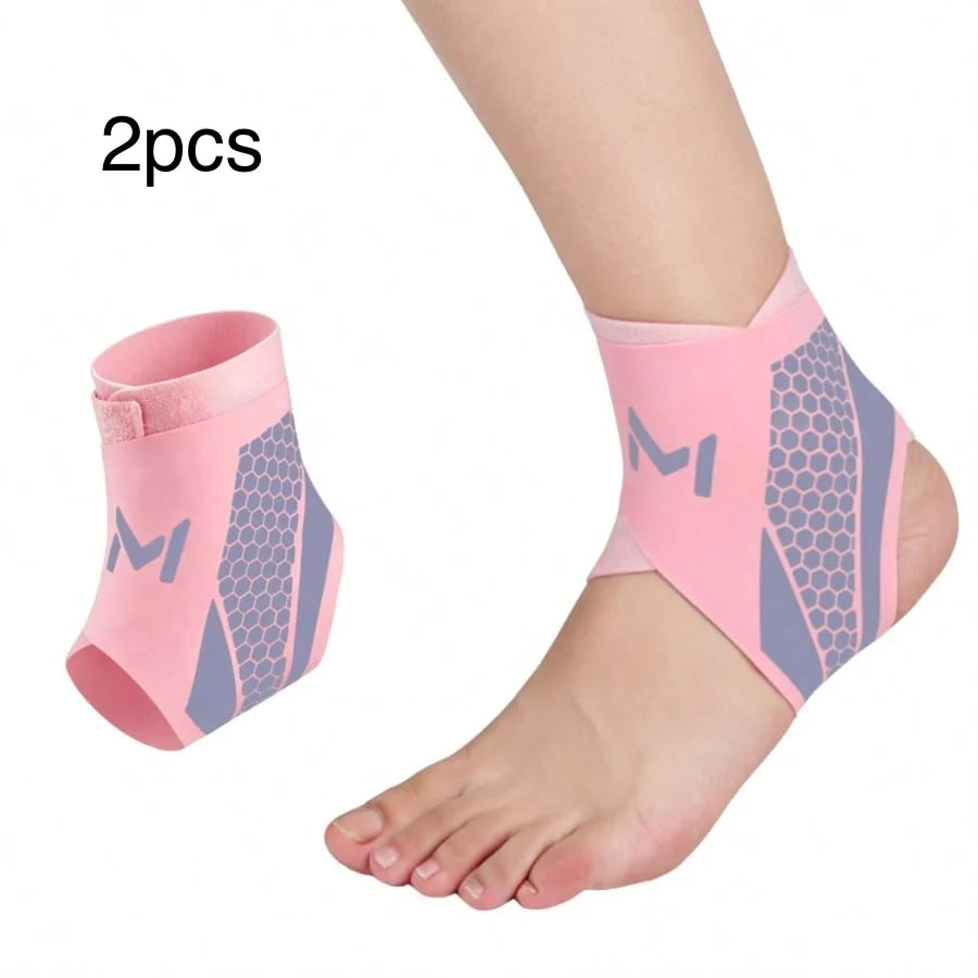 Two pink compression ankle support foot sleeves shown on a person's ankle.