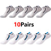 Ten pairs of men's color-block mesh ankle socks shown in various gray and white patterns.