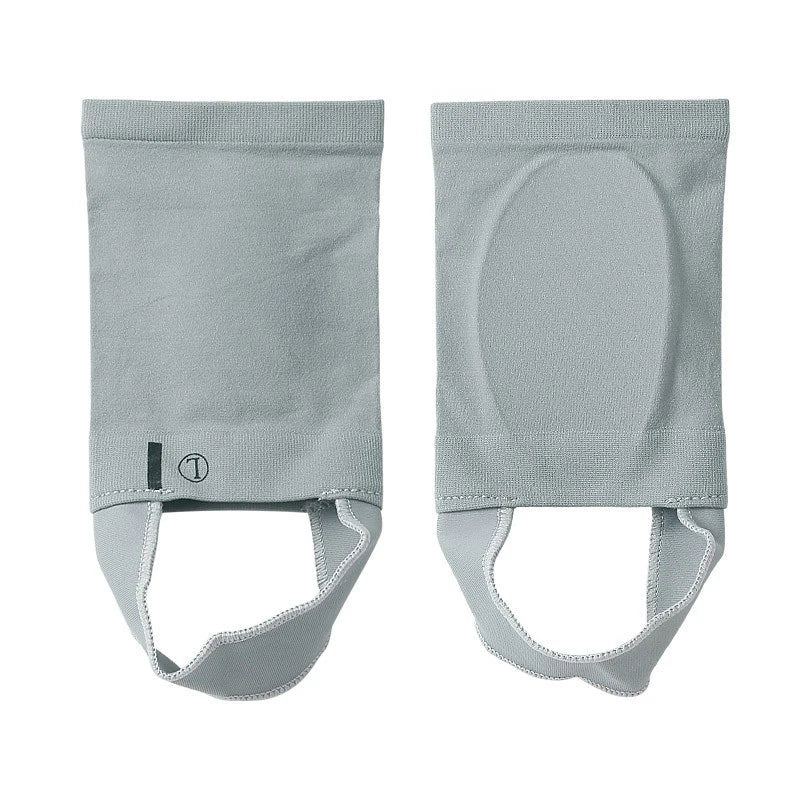A pair of light gray silicone arch support insoles for foot comfort.