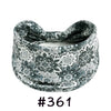 A patterned grey and white boho knotted cotton headband for yoga or workout.