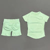 A light mint green seamless yoga set for women featuring a short sleeve top and workout leggings.