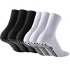 Un ensemble de chaussettes de football antidérapantes en silicone noir et blanc, présentées en rangée.