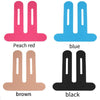 Four colored kinesiology therapy tapes for knee support: peach red, blue, brown, and black.