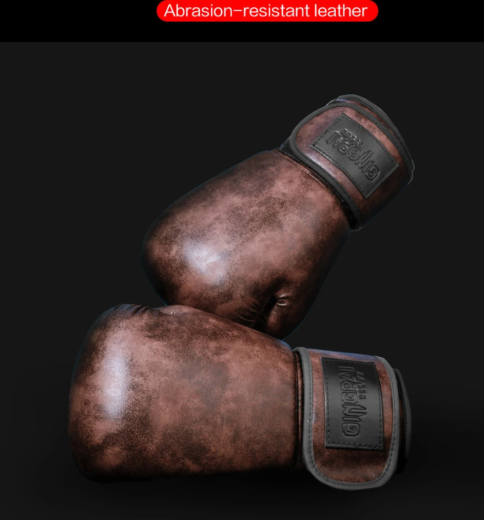 A pair of brown leather boxing gloves shown against a dark background.