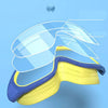 A pair of yellow and blue swimming goggles with clear lenses floating above them against a light blue background.