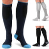 A set of compression socks in navy blue and black with light gray accents shown on a foot.