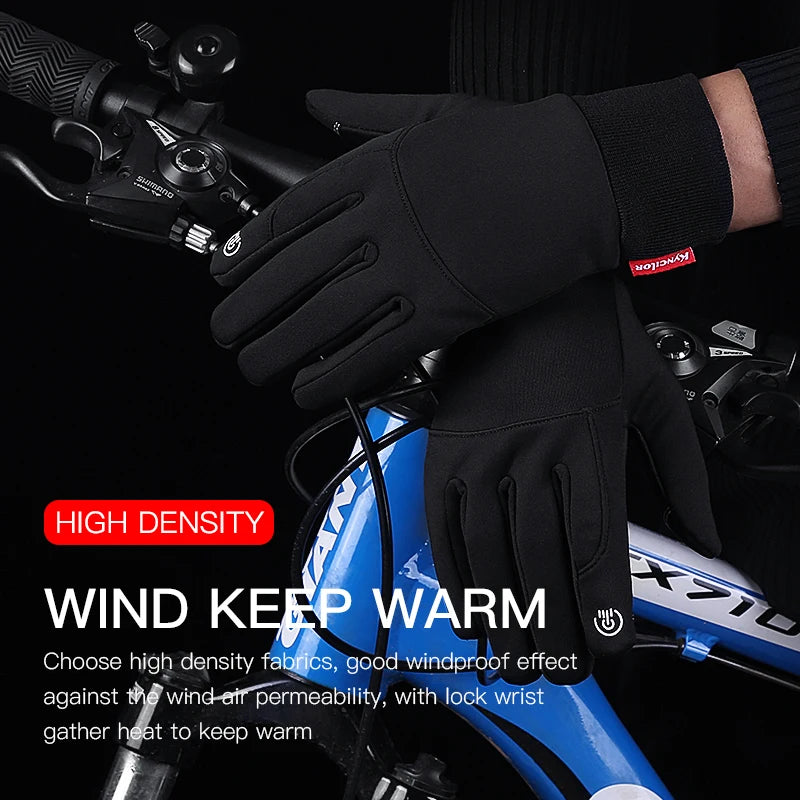 Black high-density sports gloves being worn on a hand holding a bicycle handlebar.