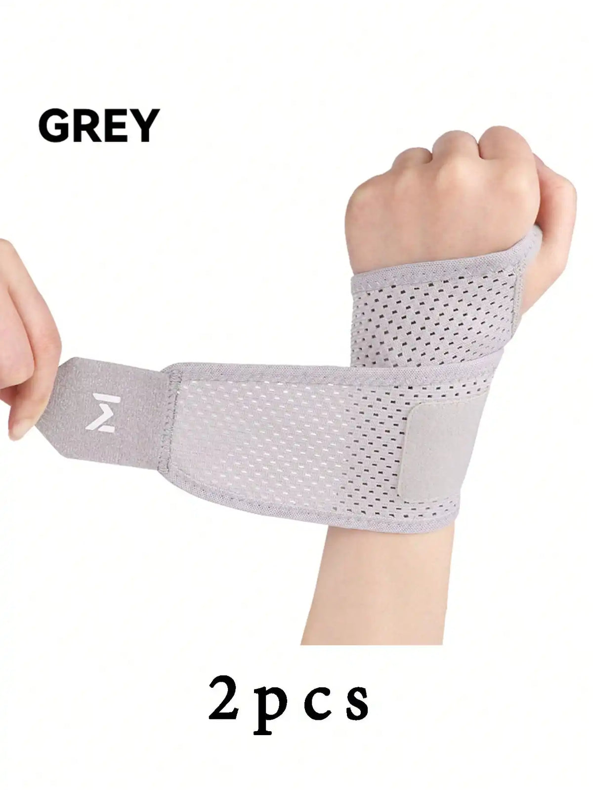 A grey adjustable wrist support brace is shown on a hand, with two pieces included.
