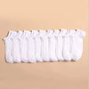 A row of white breathable unisex boat socks laid out on a light beige background.