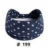 Navy blue polka dot knotted headband for yoga and workout