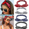 Close-up of a woman wearing red paisley elastic hair headbands in various styles and colors