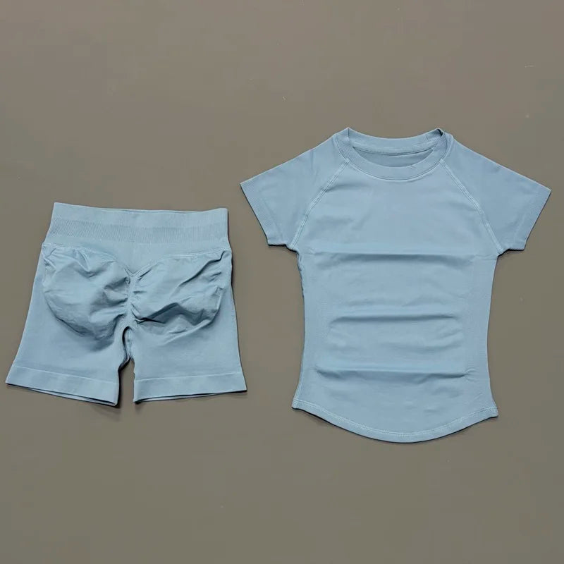 Light blue seamless yoga set for women featuring a short sleeve top and workout leggings