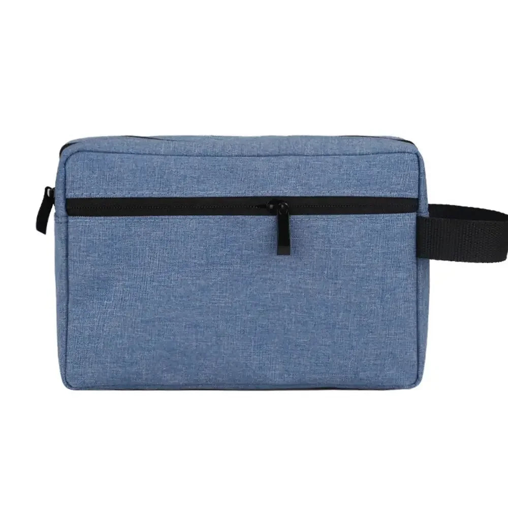 A light blue waterproof cosmetic and travel pouch with a black zipper and strap.