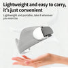 A hand is holding a lightweight, gray silicone knee pad designed for joint support.
