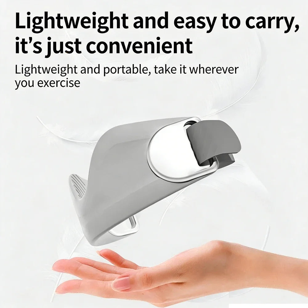 A hand is holding a lightweight, gray silicone knee pad designed for joint support.