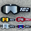 A collection of three pairs of 10C motorcycle and ATV goggles in black, red, and silver finishes.