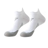 A pair of white breathable anti-blister running socks shown from the side.