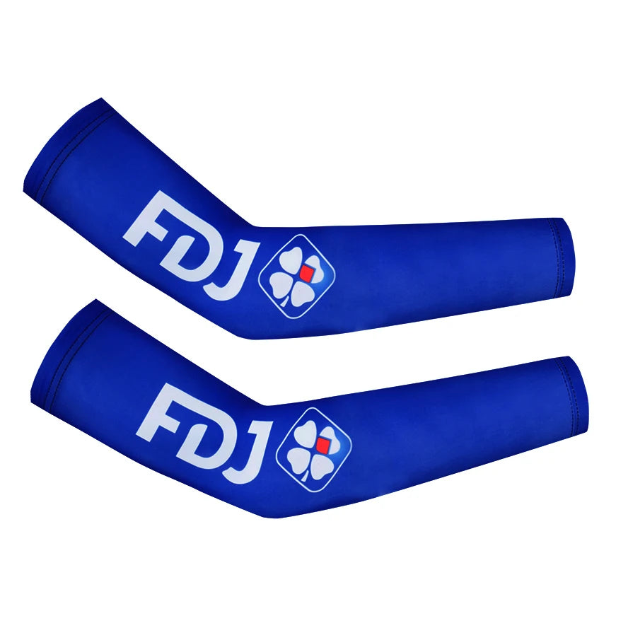 A pair of royal blue cycling arm warmers featuring the FDJ logo with a shamrock design.