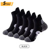 Five pairs of black men's performance running and sport socks displayed on a white background.