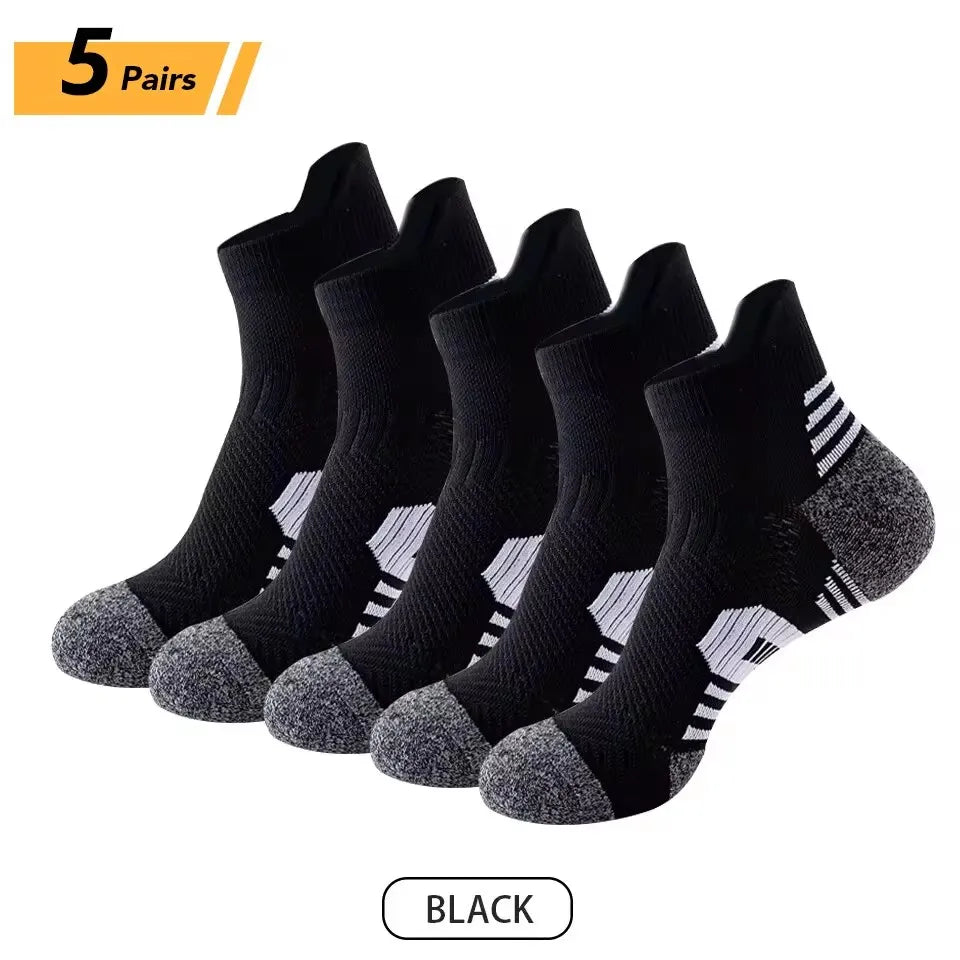Five pairs of black men's performance running and sport socks displayed on a white background.