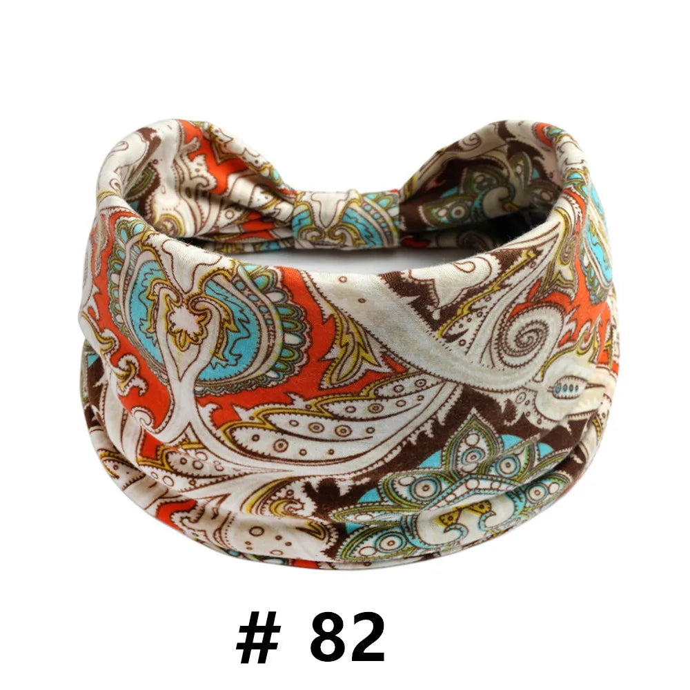 Boho print cotton headband featuring an orange, teal, and brown paisley pattern.