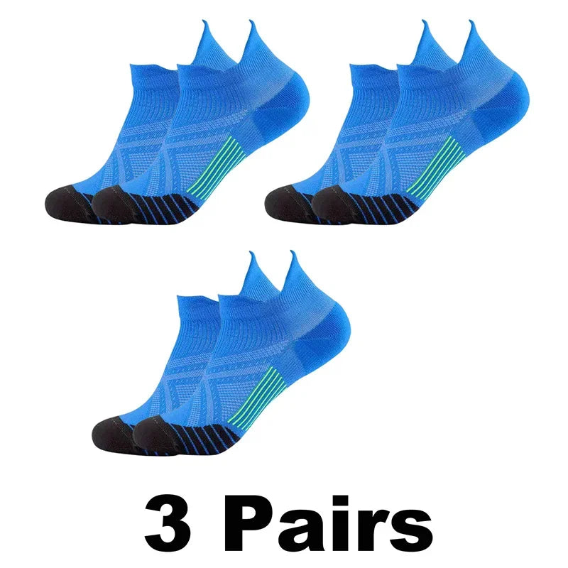 Three pairs of blue performance compression sports socks for ankle protection
