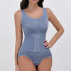 A model wearing a light blue zippered shapewear bodysuit for waist slimming.