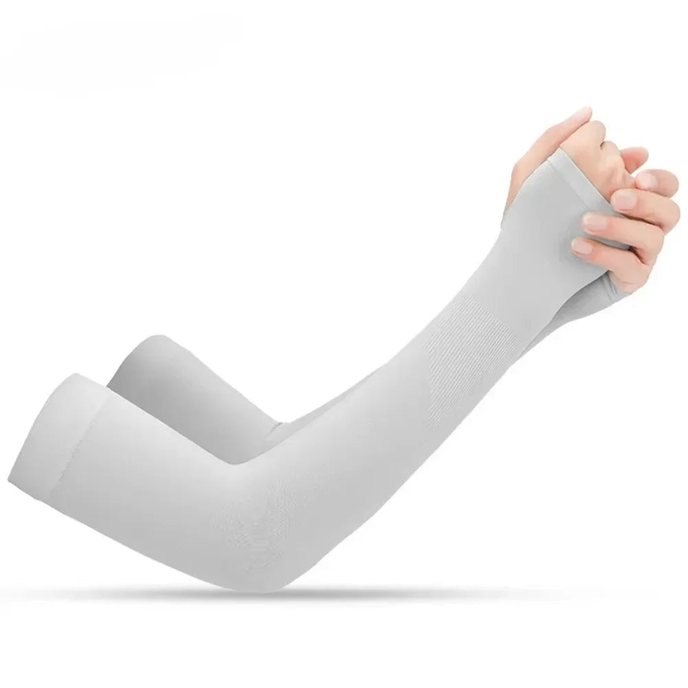 A person is wearing a white UV protection arm sleeve on their forearm.