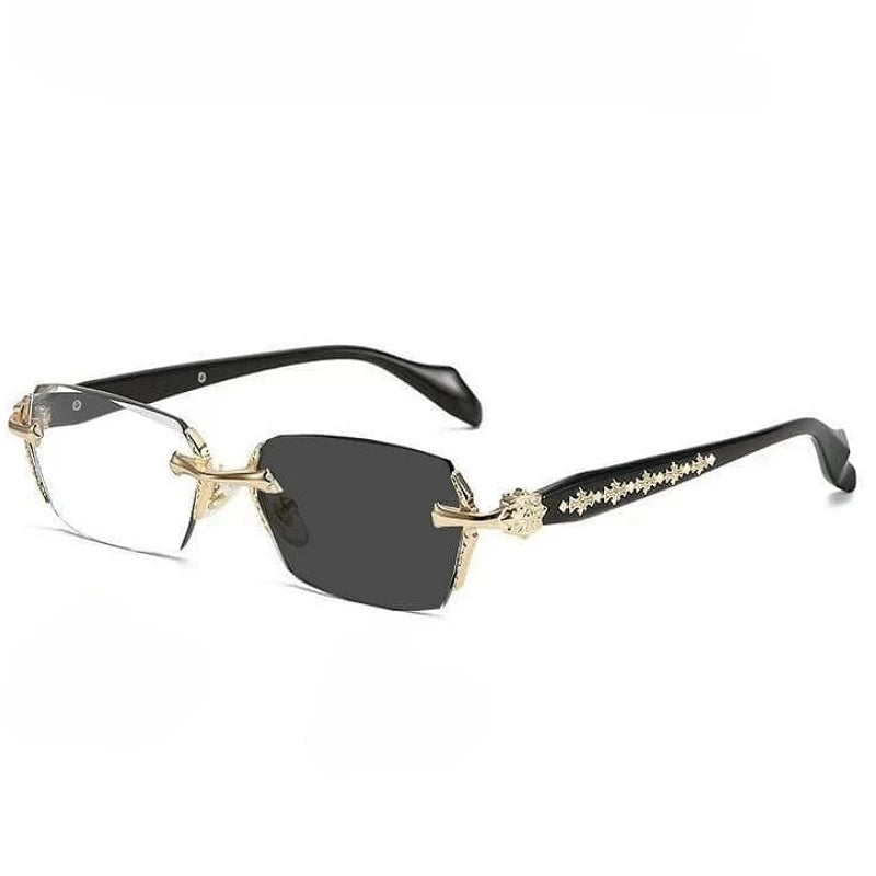 A pair of black frameless photochromic prescription glasses with gold accents.