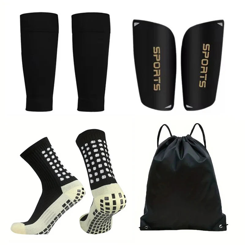 A pack of four black non-slip silicone sports socks for football and basketball