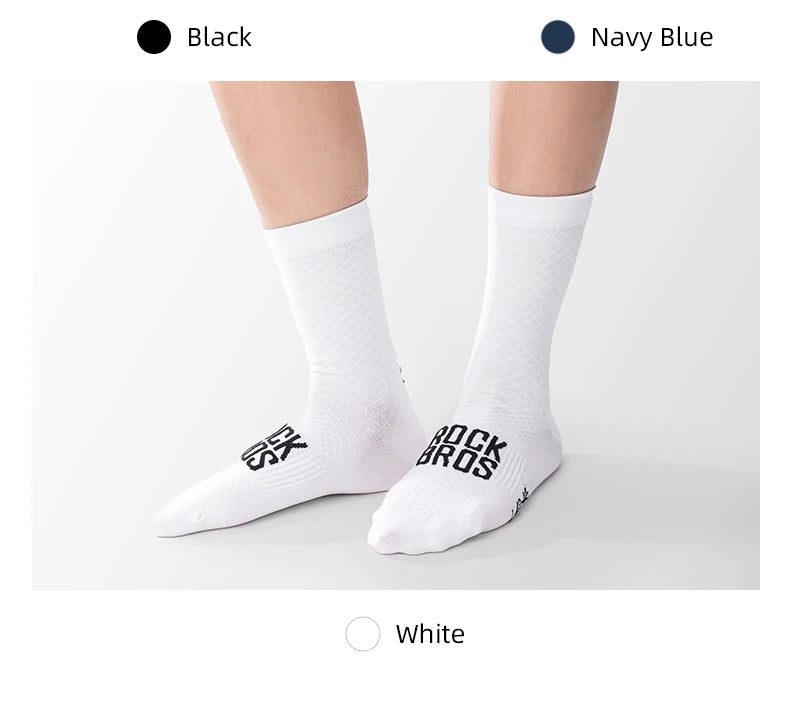 A pair of white high elastic cycling and hiking socks displayed on a flat surface.