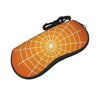 An orange pouch shaped like a spider web is shown with a black strap.