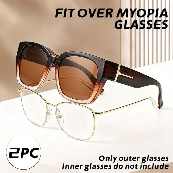 Brown tinted polarized sunglasses with gold accents shown against a light background.