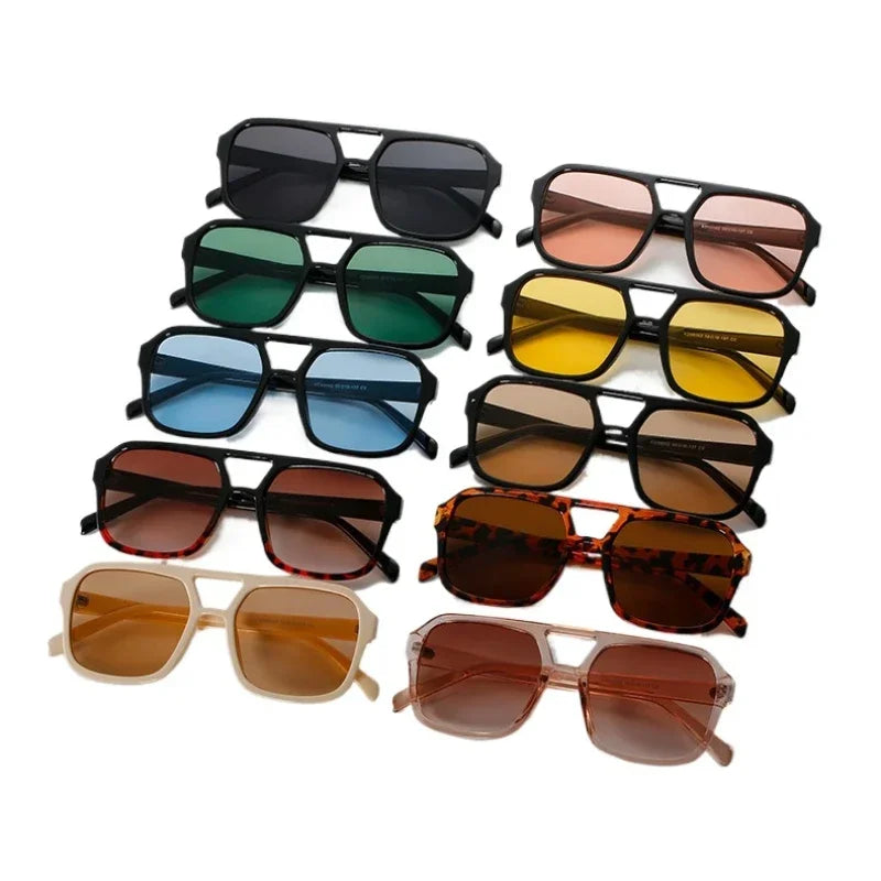 Colección de gafas de sol cuadradas ligeras en varios colores, incluyendo negro, verde, ámbar y tonos marrones.