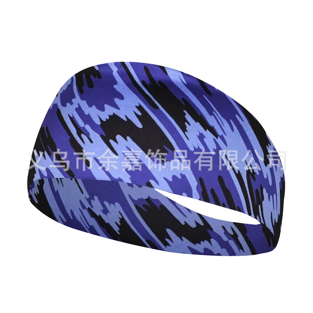 A purple and black patterned elastic sports headband shown from the side.