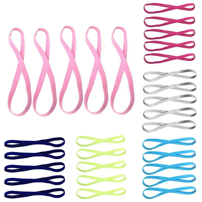 A set of five multi-functional elastic sports headbands in various shades of pink and gray.