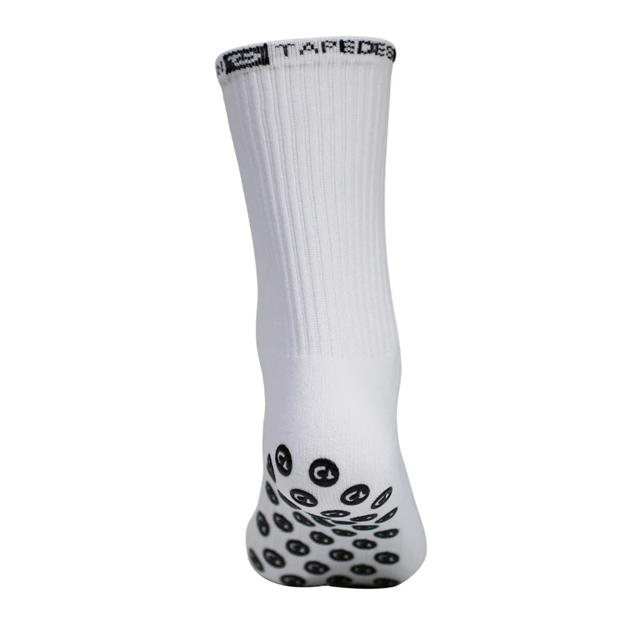 White performance sports gripping socks with a black patterned toe and cuff