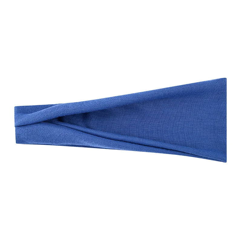 Un bandeau élastique bleu royal plié pour les cheveux ou le maquillage.
