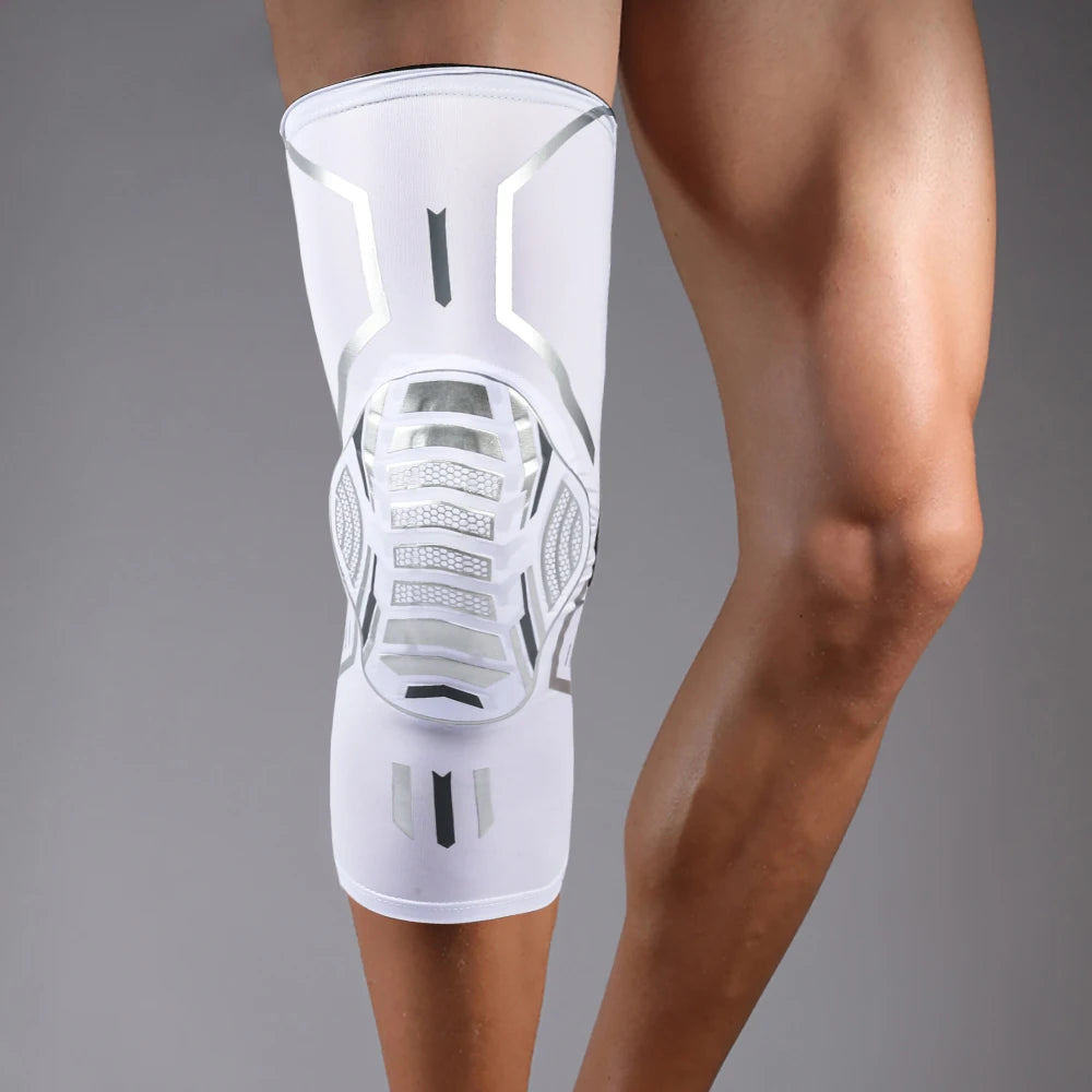 A white compression knee brace with a translucent, skeletal design is worn on a person's lower leg.