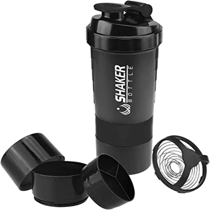 Black portable protein shaker bottle with a separate shaker cup and lid.