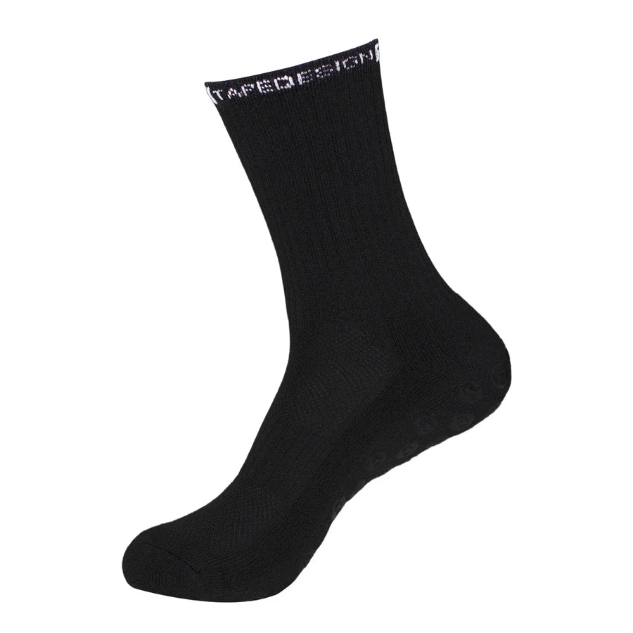 Black performance sports gripping socks shown in a side view.