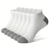 A stack of white and gray men's cotton blend ankle socks for sports and running