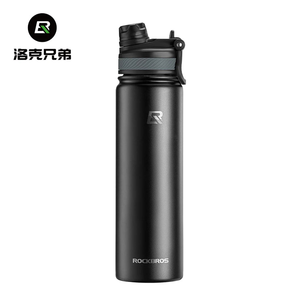 Termo de acero inoxidable aislado negro con tapa plateada y cuerpo negro.
