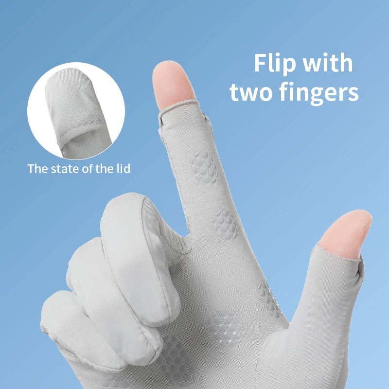 A hand wearing light gray UV protection driving gloves, demonstrating how to flip the lid with two fingers.