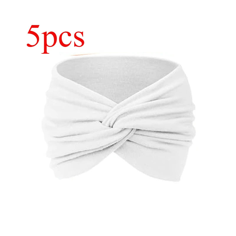 Cinco diademas de tela blancas atadas en un lazo, adecuadas para fitness y yoga.