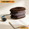 A stack of dark brown and gray inflatable cervical traction stretchers resting on a white surface.