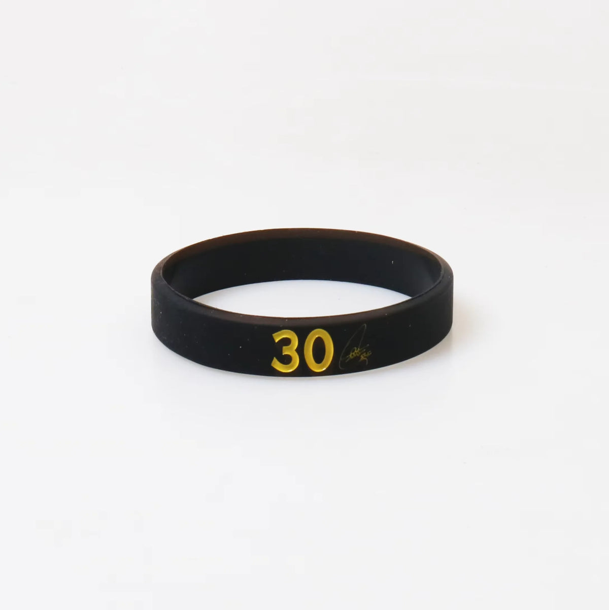 Black silicone wristband with the number 30 embossed on the surface.