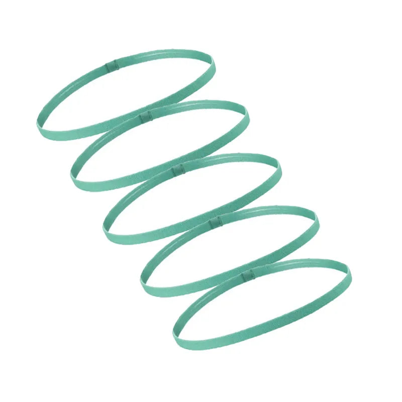 A set of five teal elastic sports headbands coiled in a spiral shape.
